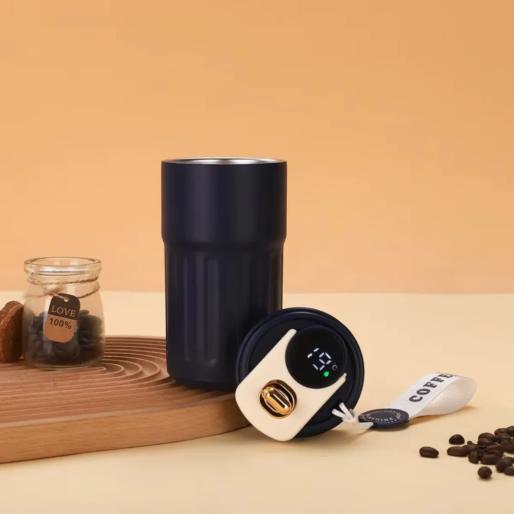 tumbler_with_golden_button.webp